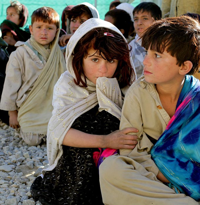 refugee children sitting together