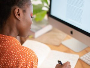 woman reviewing cover letter
