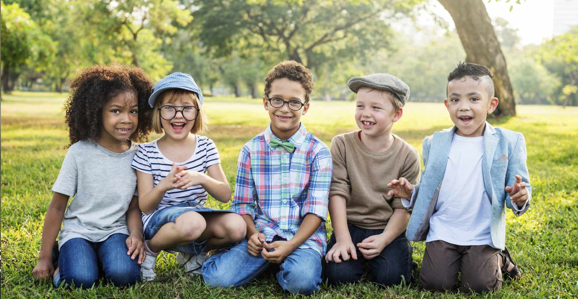 photo of Children playing with bubbles